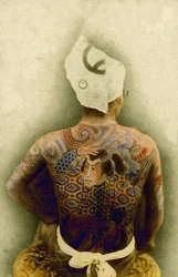 Mann med tradisjonell japansk Irezumi-tatovering, ca. 1880 (håndfarget albumbilde)