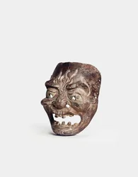 En Gigaku-maske i tre (tre)