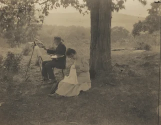 Kvinne som syr, mann som maler, 1900 (foto)