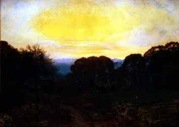 En gartner graver en kållapp ved solnedgang