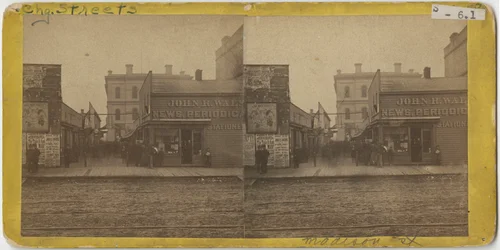 Utsikt over John R. Walsh Periodicals-butikken på Madison Street, Chicago med postkontoret i bakgrunnen, 1869