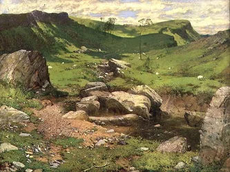 En steinete bekk i et fjellandskap