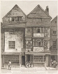 Hus på sørsiden av en gate kalt London Wall