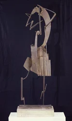 Kvinne som ordner håret, 1929-30 (metall)