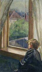 Kvinne ved vinduet