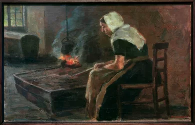 Kvinne ved åpen peis
