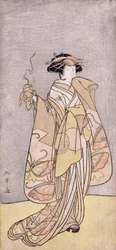 Et portrett i full lengde av skuespilleren Ichikawa Monnosuke II i en kvinnelig rolle som holder en røkelsesbrenner (farget treblokktrykk)