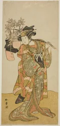 Skuespilleren Yamashita Kinsaku II som Odai, en Eboshi (hat)-selger, i stykket Hana-zumo Genji Hiiki, fremført på Nakamura Theatre i den ellevte måneden, 1775