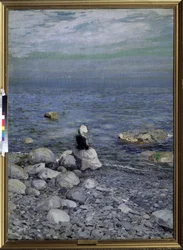 Ved Svartehavets kyst. En elegant kvinne sitter alene på steinene på stranden og ser mot horisonten over havet. Maleri av Konstantin Alexeyevich Korovin (Constantin Korovine) (1861-1939), omkring 1890