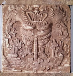 Koreansk kunst: grå terrakottastein som forestiller et monster. Kongeriket Baekje (også Paekche eller Paikchei), Korea. 7. århundre. Koreas nasjonalmuseum