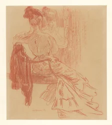Sittende dame foran speilet