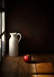 Stilleben med eple og fruktkål