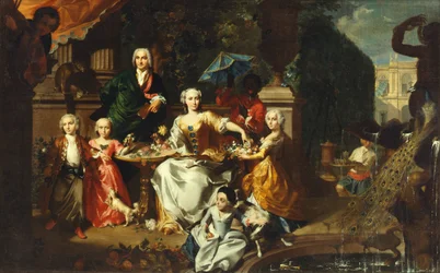 En familiegruppe på en terrasse på eiendommen til en villa. Muligens den engelske forretningsmannen George Jackson og hans familie