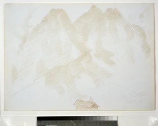 Fjelllandskap med bygninger i forgrunnen