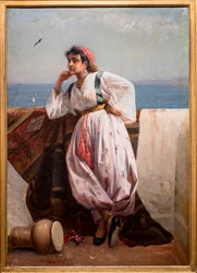 Ung orientalsk kvinne på en terrasse i Alger