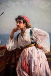 Ung orientalsk kvinne på en terrasse i Alger