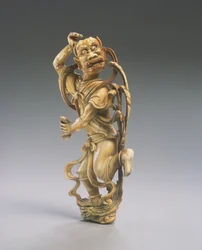 En figur av Kui xing (utskåret elfenben) (se også 272115)