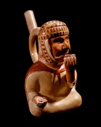 Precolombiansk kunst, Mochique-sivilisasjon (stygg, Mochica): antropomorf vase som representerer en blind tigger som spiller et musikkinstrument (panfløyte?). 200 f.Kr.-700 e.Kr. Lima, Nasjonalmuseet for antropologi og arkeologi, Peru - førkolumbiansk kuns