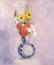 Bukett med blomster i en blå vase,