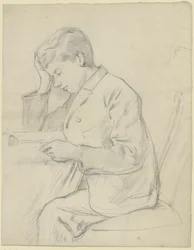 Victor Scholderer leser ved bordet