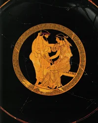 Kjærlighetsscene. Midtmedaljong av en rødfiguret kopp. Samme kopp som 10-03-04/7 og 8 …