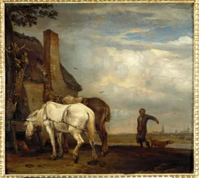 To hester foran en bondehytte.