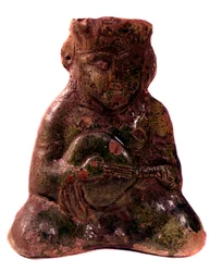 Persisk kunst: vase i form av en mandolinspiller München fra 1200-tallet.