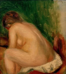 Sittende naken kvinne