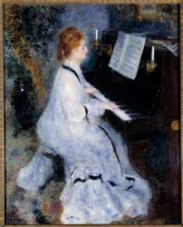 Ung kvinne ved pianoet