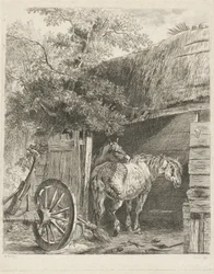 To hester i en låve