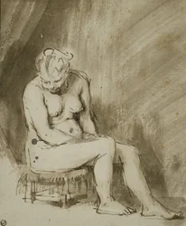 Sittende naken kvinne