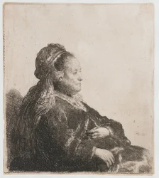 Rembrandts mor sitter Kunstnerens mor sittende, i en orientalsk hodeplagg: halv lengde