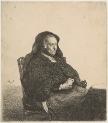 Kunstnerens mor sitter ved et bord og ser rett ut: Trekvart lengde, ca. 1631.