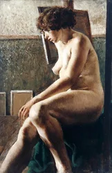 Kvinnefigur sittende