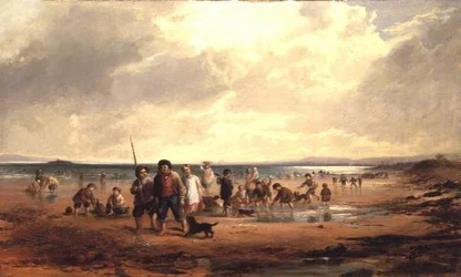 Barn som leker på en strand