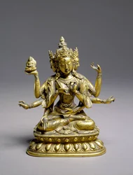 Sittende Usnisavijaya, Qing-dynastiet (bronse med forgylling og malakitt)