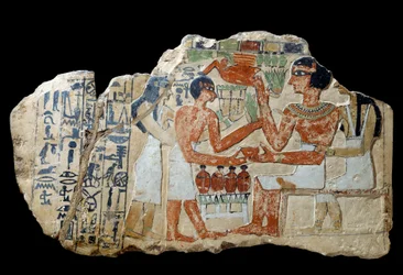 Egyptisk antikk: Iri-stele i kalkstein. Et par gir et tilbud. Første mellomperiode (2200-2033 f.Kr.) Søn. 0,3x0,52 m Paris, Louvre-museet