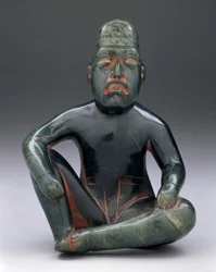 Sittende figur med hevet kne, Highland Olmec, San Martin Texmelucan
