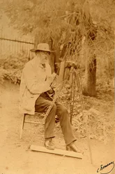 Portrett av poeten Yakov Petrovich Polonsky (Iakov Petrovitch Polonski) (1819-1898) ved staffeliet. Albumin-foto av Sergei Dmitrievich Botkin (1869-1945)