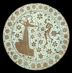 Dame som trekker en bue på en ung mann hvis nakke er krysset av en pilfajansefat av spansk produksjon. Paris fra 1500-tallet, Louvre-museet