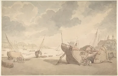 Havnescene ved lavvann, med båter som har strandet