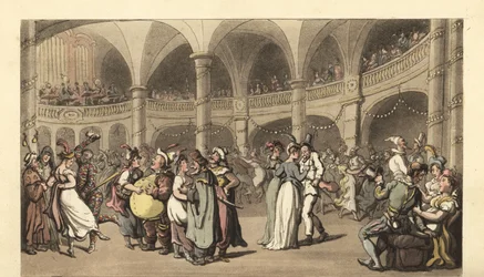 Feste i kostyme på et maskeball i et stort teater