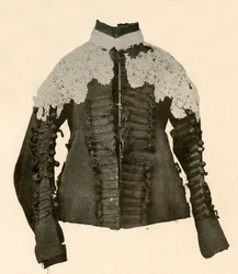Dublett av svart tøy trimmet med silkeflett og hekleknapper, 1600-tallet, 1937.