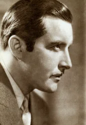 John Boles , amerikansk skuespiller, 1933