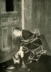John Nevil Maskelyne fremfører en åndekabinettillusjon, c1910.