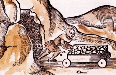 Gruvearbeider skyver en tralle fra en gruveinngang, 1508