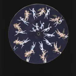 Phenakistiscope (Phenakistoscope) plate som viser en amor og to jenter, ca 1830