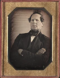 Portrett av en mann som lener seg bort fra kamera, sent på 1840-tallet.