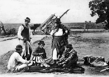 Tre menn som spiller kort, Uruguay, ca 1900-tallet