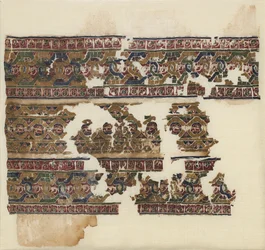 Tiraz med guillosjebånd, 1075-1125.